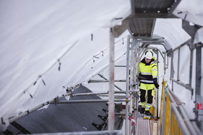 Engineer walking at building site