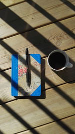 High angle view of coffee cup on table