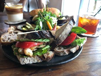 Close-up of sandwich served in plate on table