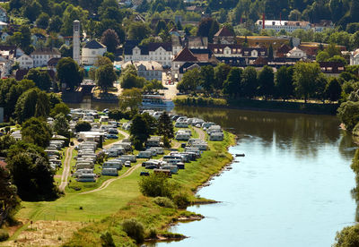 Aerial view of a campground with many caravans at a loop of the weser  near beverungen, germany