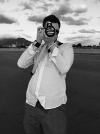 Woman standing in front of wall