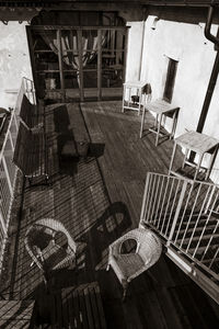 High angle view of empty chairs and tables in building