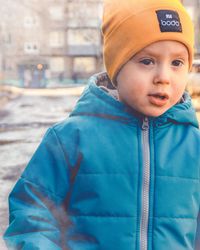 Portrait of boy in snow