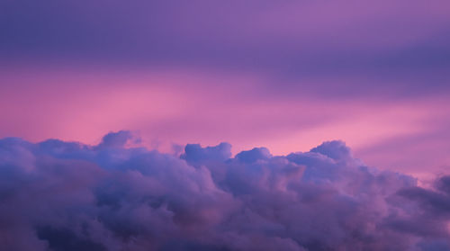 Low angle view of dramatic sky during sunset