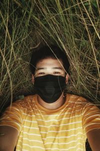 Portrait of boy in grass
