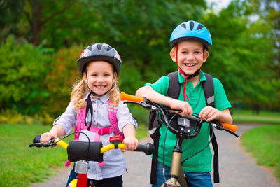 Portrait of smiling boy riding bicycle