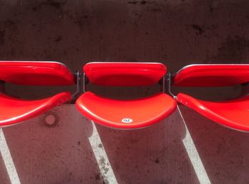 High angle view of folded seats at stadium