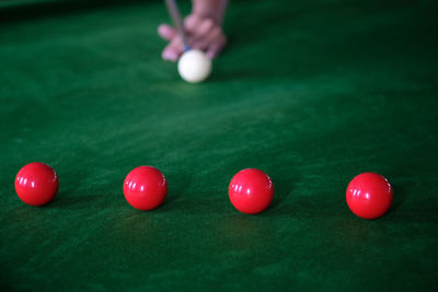 Close-up of person playing snooker