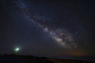 Low angle view of stars in sky at night