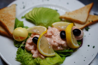 Close-up of breakfast served in plate