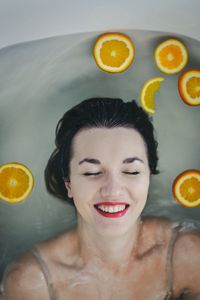 High angle view of woman in bathtub at home