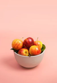 Close-up of fruits in bowl on table