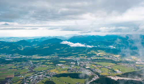 Aerial view of landscape and mountains against sky