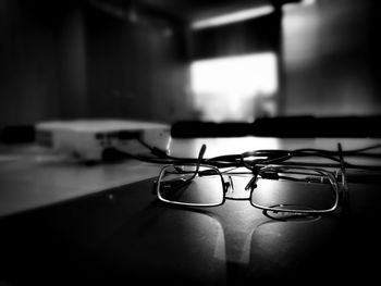 Close-up of eyeglasses on table