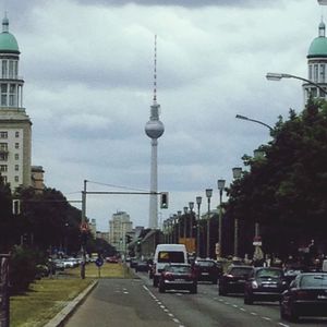 City street against cloudy sky