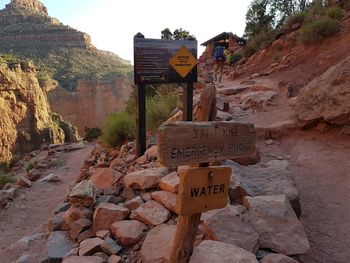 Road sign on rock
