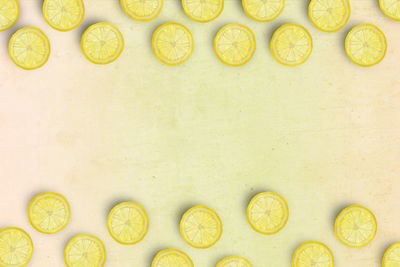 High angle view of lemon slices arranged on table