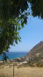 Scenic view of sea against clear blue sky