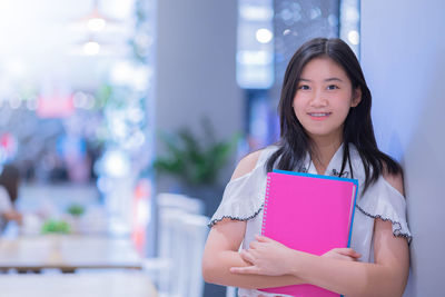 Portrait of a smiling young woman