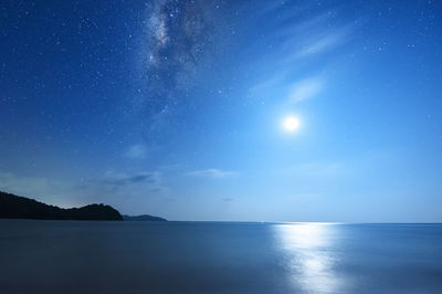 Scenic view of sea against sky at night