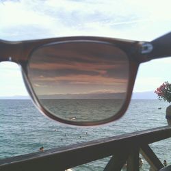 Scenic view of sea against sky at sunset