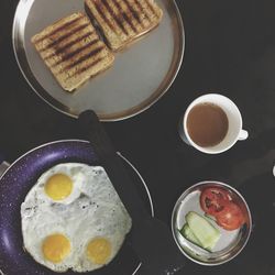 High angle view of breakfast served on table