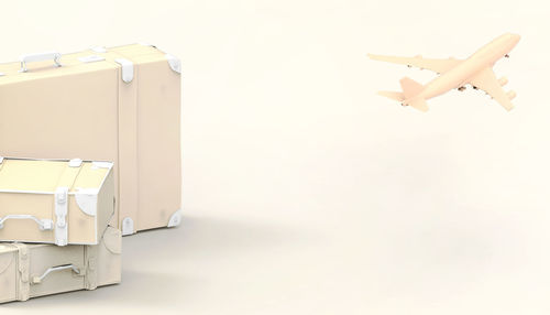 Close-up of airplane over white background