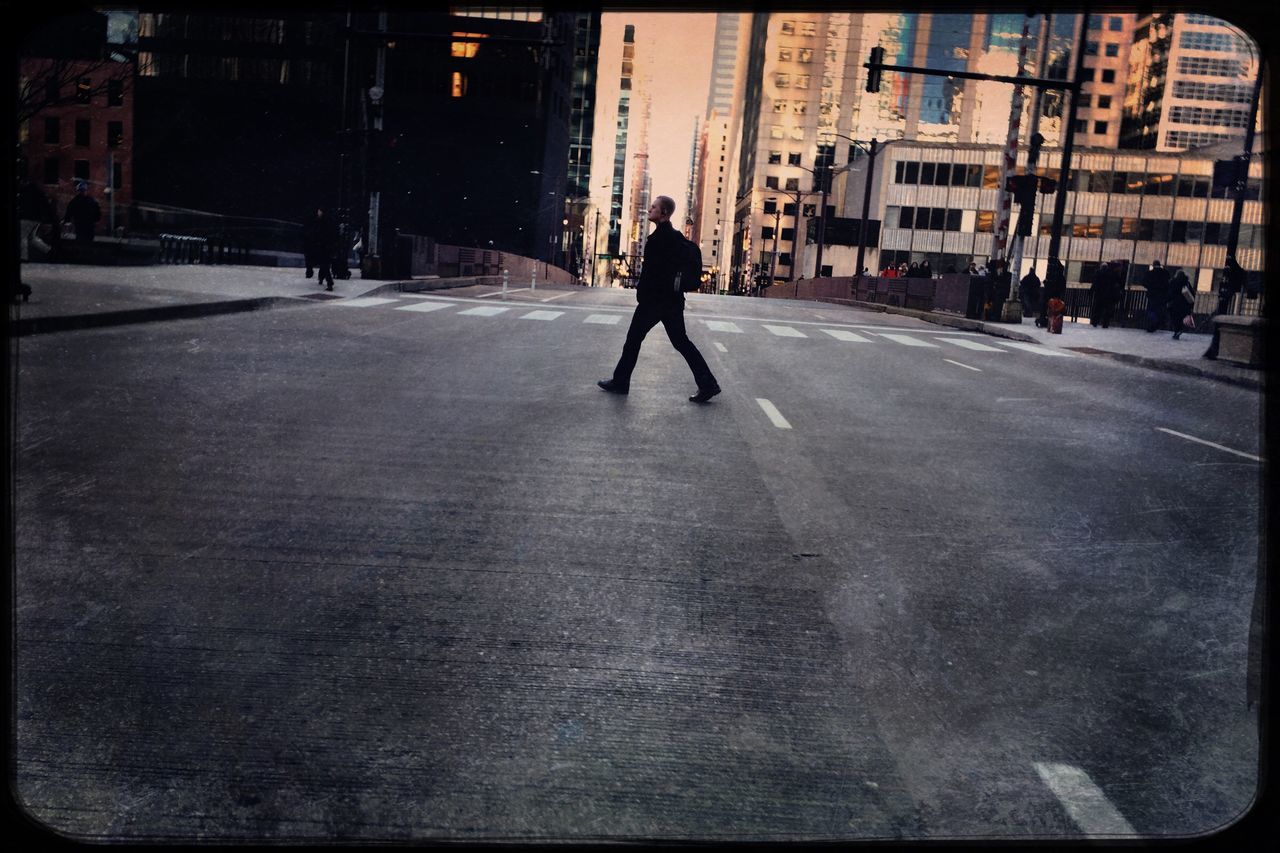 street, one person, city, walking, adults only, full length, people, asphalt, road, silhouette, adult, men, only men, one man only, outdoors, young adult, day