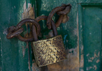 Close-up of padlock on doors