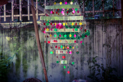 Close-up of multi colored decorations hanging on tree