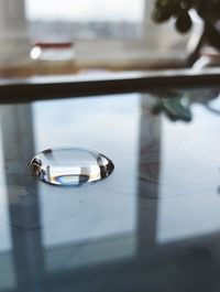High angle view of glass window on table