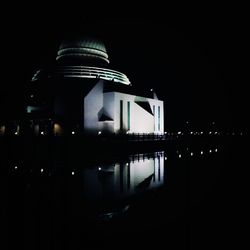 Illuminated buildings in city at night