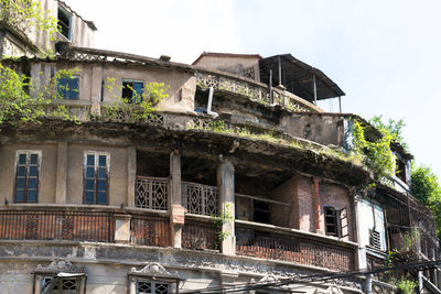 Low angle view of old building against sky