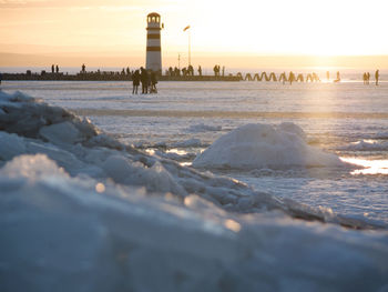 Scenic view of sea at sunset