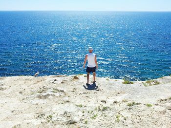 Scenic view of sea against blue sky