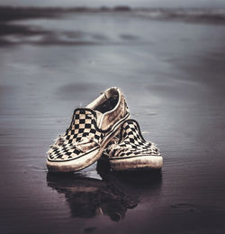 Close-up of shoes on floor