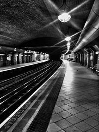 Illuminated railroad station platform