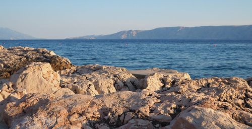 Scenic view of sea against clear sky