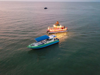 High angle view of ship sailing in sea