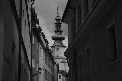 Low angle view of buildings in city against sky