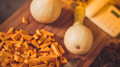 Close-up of pumpkins on cutting board