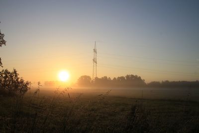 Scenic view of landscape at sunset