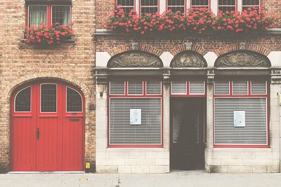 Closed red door of building