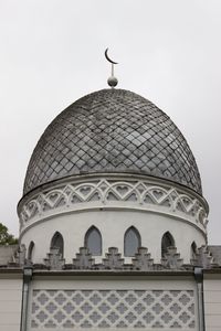 Low angle view of mosque against clear sky