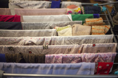 Close-up of clothes on drying rack