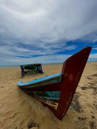 The ship that has been buried by the sand on the coast of kalimantan