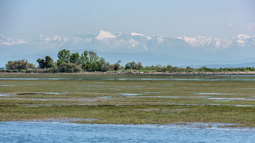 Scenic view of lake against sky