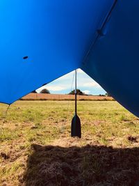 Scenic view of field against clear blue sky