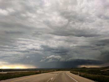 Road against cloudy sky