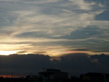 Scenic view of cloudy sky at sunset